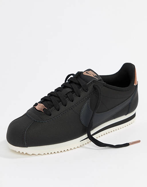 Nike - Cortez - Sneakers nere e oro ترتيبات