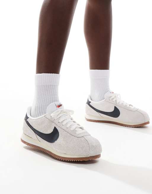 Nike Cortez Suede sneakers in white and black