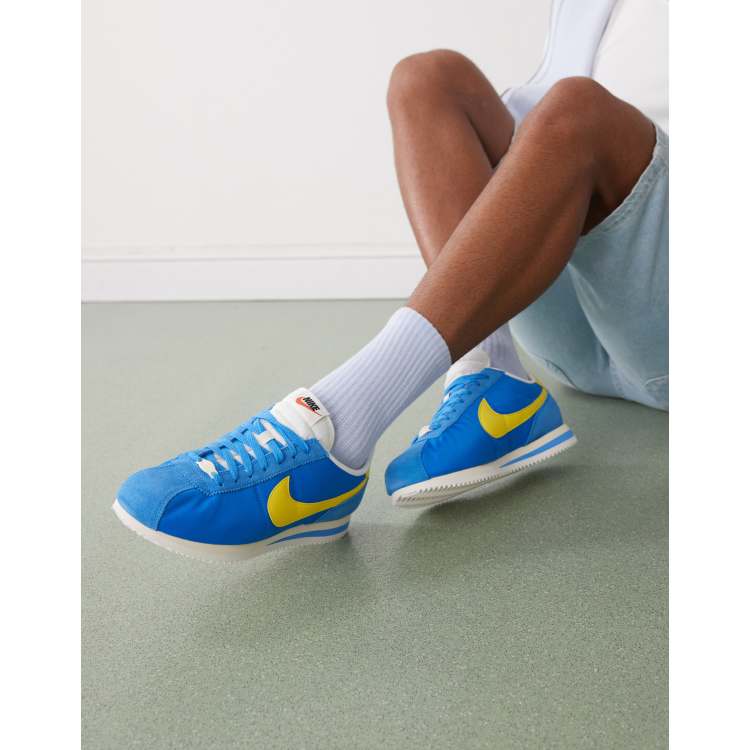 Nike Cortez Textile sneakers in blue and yellow | ASOS