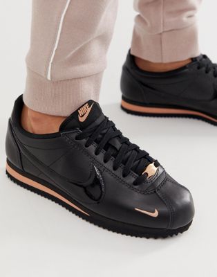 nike black and gold cortez