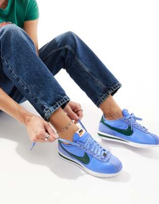 Nike Cortez trainers in blue and green