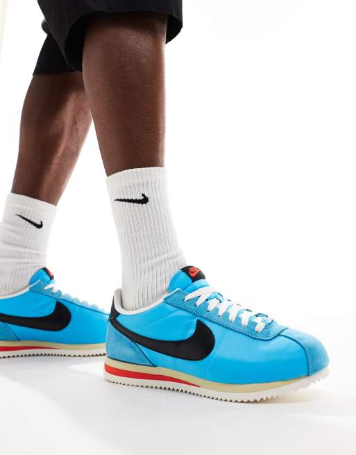 Nike Cortez TXT sneakers in blue and black