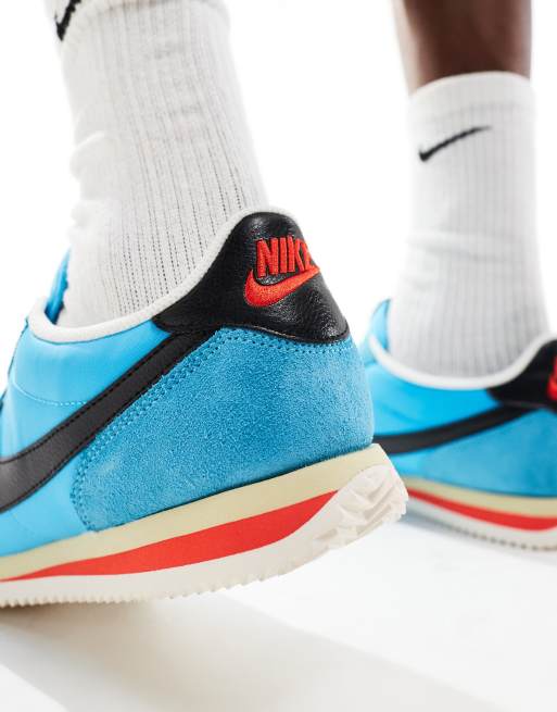 Blue and black nike cortez online