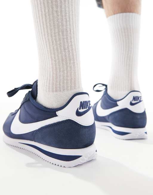 Navy blue and white nike sneakers best sale