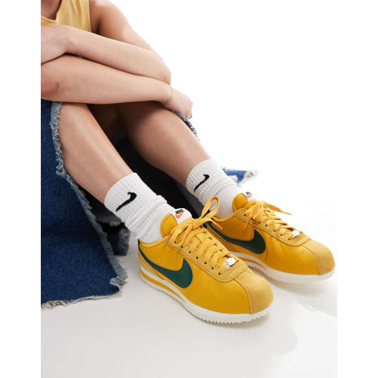 Nike Cortez TXT sneakers in yellow and green ASOS