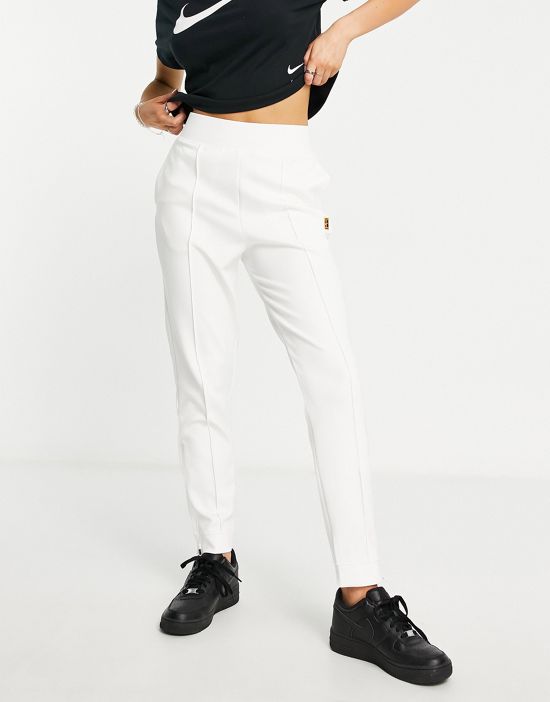 https://images.asos-media.com/products/nike-court-dri-fit-heritage-polyknit-sweatpants-in-white/201307183-1-purple?$n_550w$&wid=550&fit=constrain