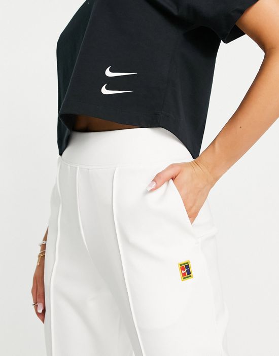 https://images.asos-media.com/products/nike-court-dri-fit-heritage-polyknit-sweatpants-in-white/201307183-3?$n_550w$&wid=550&fit=constrain