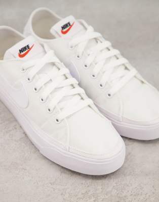 white canvas nike sneakers