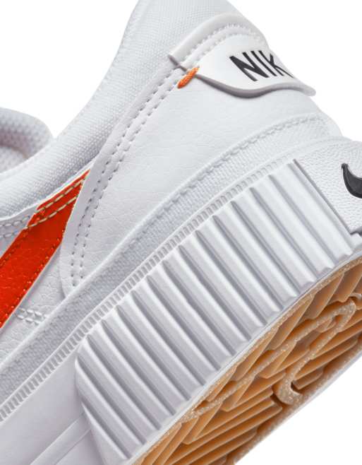 Nike Court Legacy Lift sneakers in white and team orange