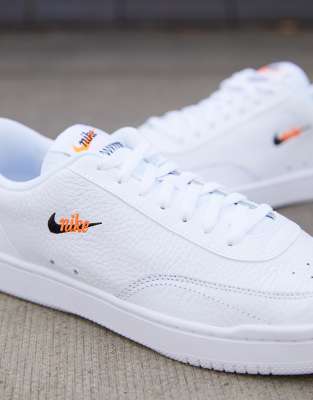 white nike court trainers