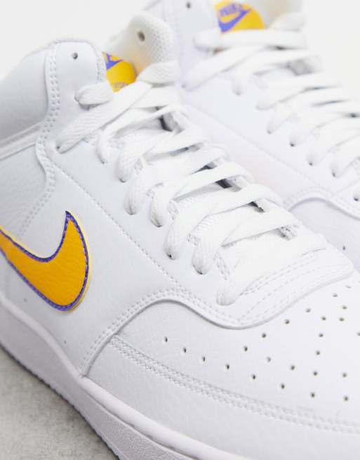 Nike Court Vision trainers in white with yellow swoosh ASOS