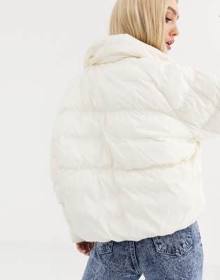 Nike cream high neck puffer jacket | ASOS