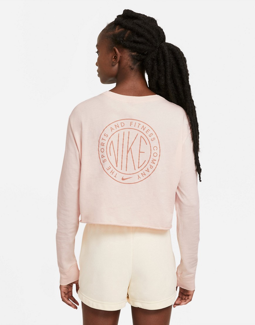 Nike cropped long sleeve T-shirt in baby pink with back print