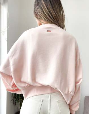 baby pink nike sweatshirt