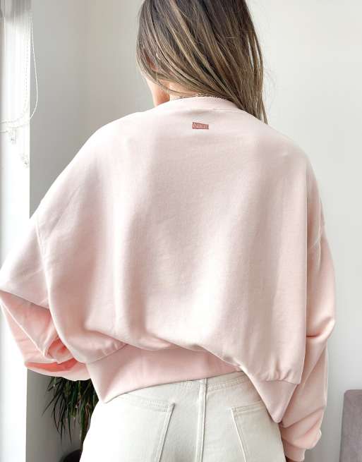 Nike baby pink sales sweatshirt