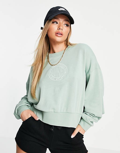 Nike cropped sweatshirt in light green with chest print logo | ASOS