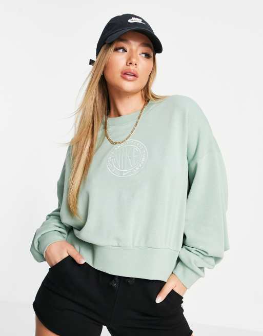 Nike cropped sweatshirt in light green with chest print logo