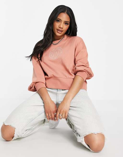 Nike cropped sweatshirt in tan with chest print logo