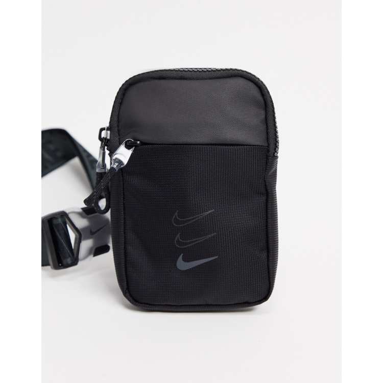 Nike cross body bag with branded straps in black ASOS