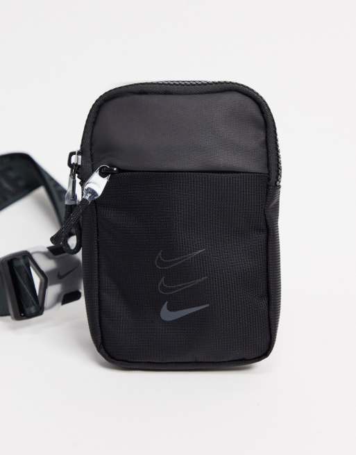 Nike cross body bag with branded straps in black ASOS