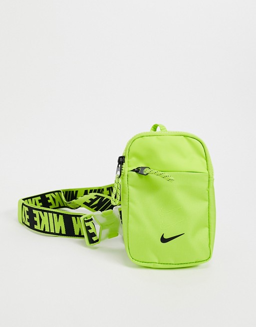 Nike cross body bag with branded straps in neon yellow