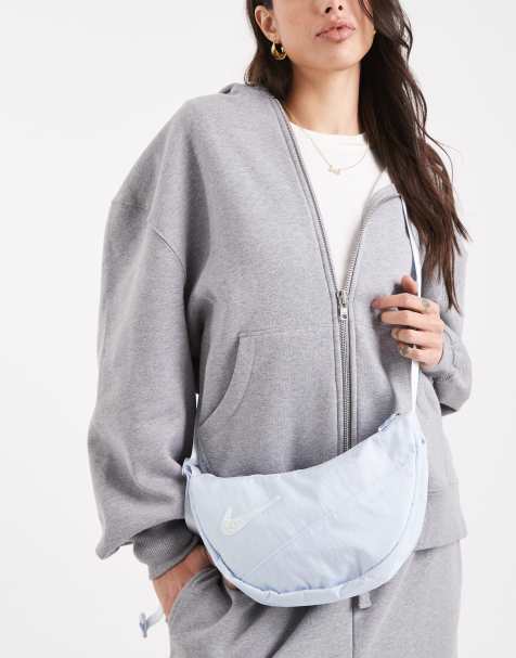 Nike crossbody bag with embellished swoosh in blue - view 1