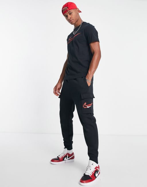 Nike – Czarne joggersy polarowe typu bojówki z logo Swoosh z efektem 3D