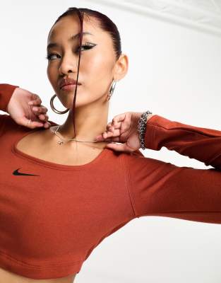 Nike Dance long sleeve crop top in rugged orange