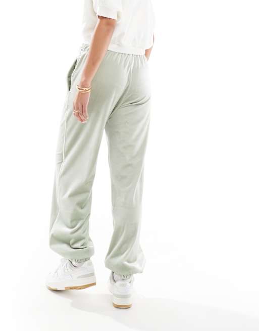 Nike Dance velvet joggers in green ASOS