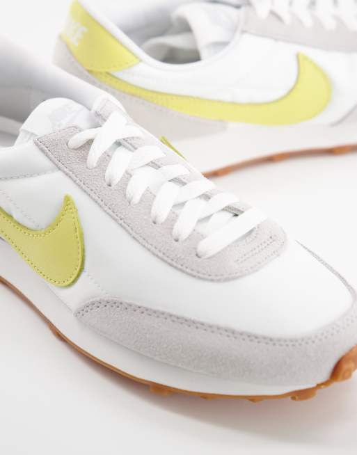 Nike white sale and yellow trainers