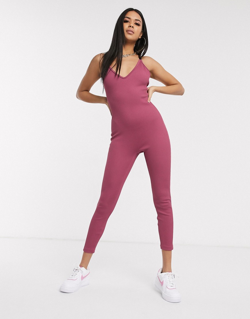 Nike - Diepuitgesneden jumpsuit met lage rug in paars