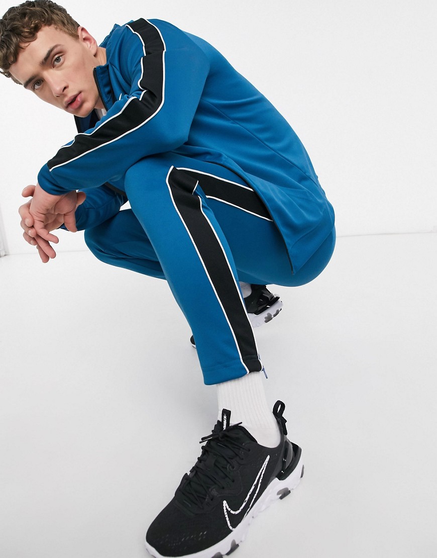 Nike – DNA Pack – Blå mjukisbyxor i stickad polyester med muddar