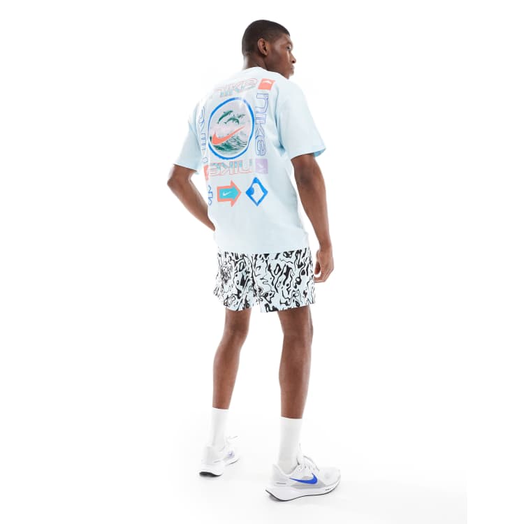 Nike Dolphin backprint T-shirt in light blue | ASOS