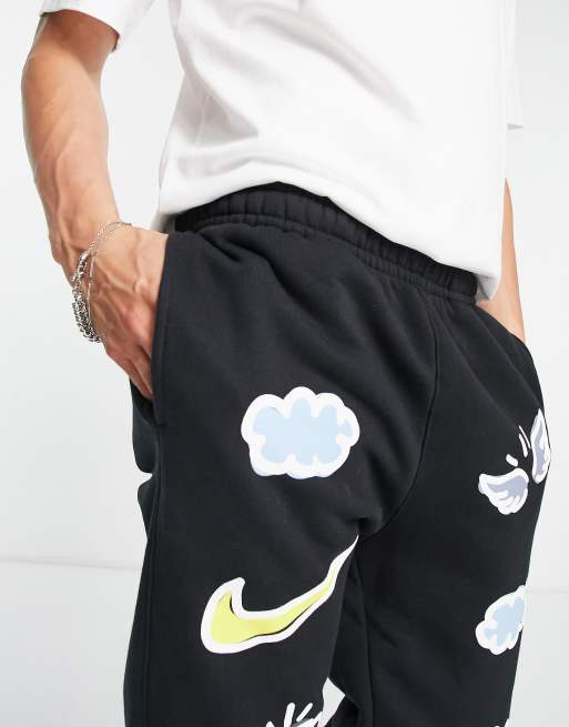 Nike Doodleglyph graphic cuffed sweatpants in black