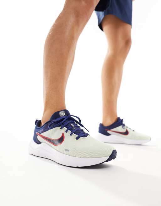 Nike Downshifter 12 in white and navy | ASOS