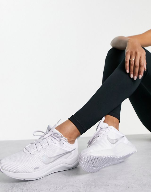 Nike Downshifter 12 sneakers in white