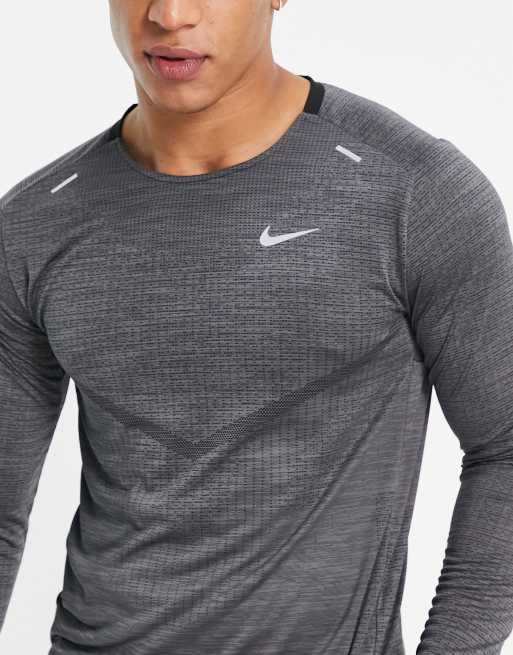 vliegtuigen Mammoet spelen Nike Dri-FIT ADV Techknit Ultra long sleeve running top in black | ASOS