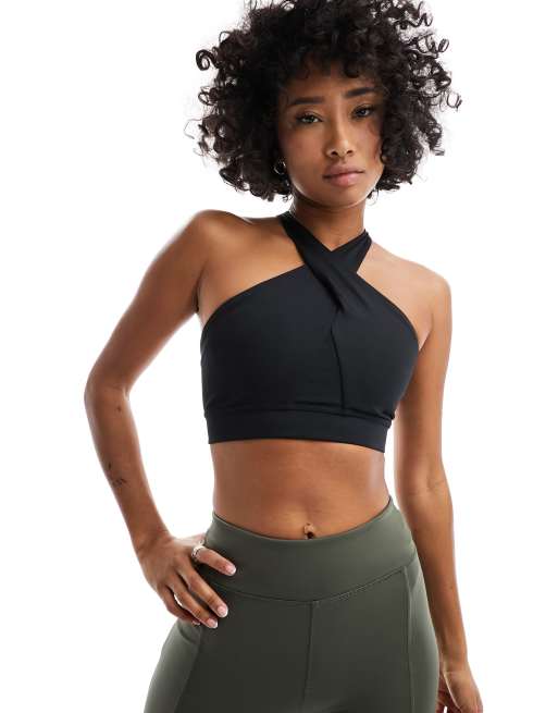 Nike Dri FIT Road To Wellness Swoosh wrap sports bra in black ASOS