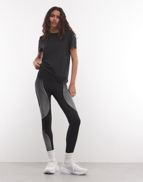 Nike Dri-Fit Swift leggings in black - view 1