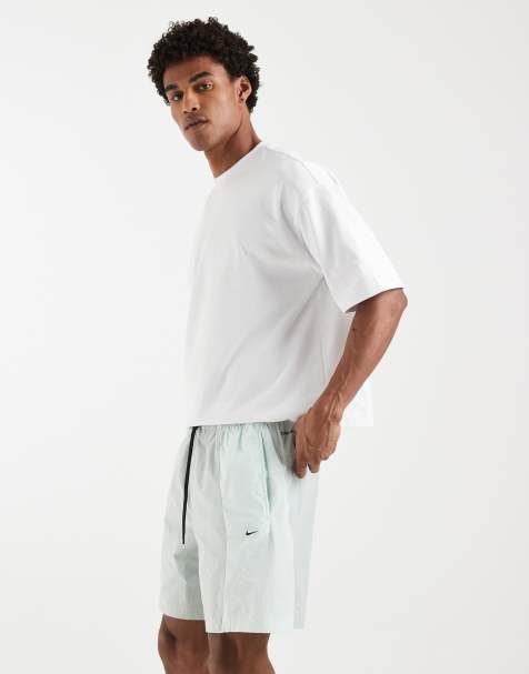 Nike Dri-FIT woven shorts in grey and green - view 1
