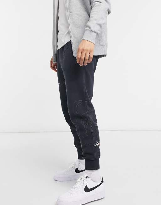 Nike Drip wash sweatpants in washed black ASOS