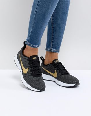 nike gold tick trainers