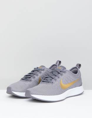 nike grey and gold trainers