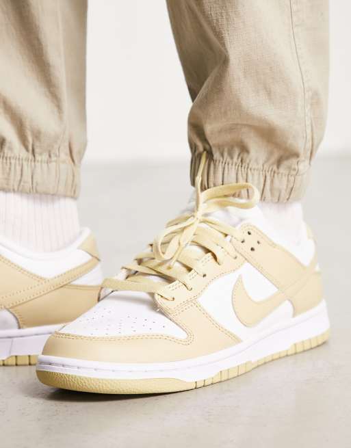 Nike blanche cheap et dore