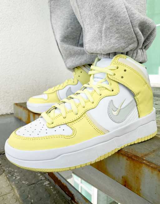 Nike Dunk Hi Up trainers in white and yellow