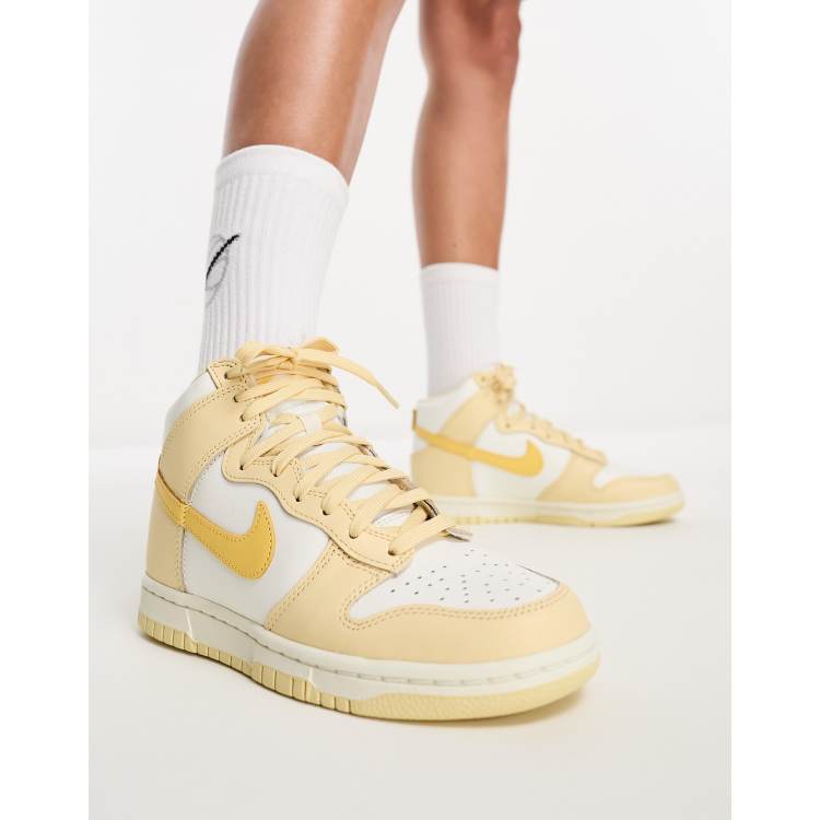 Gold nike high clearance tops