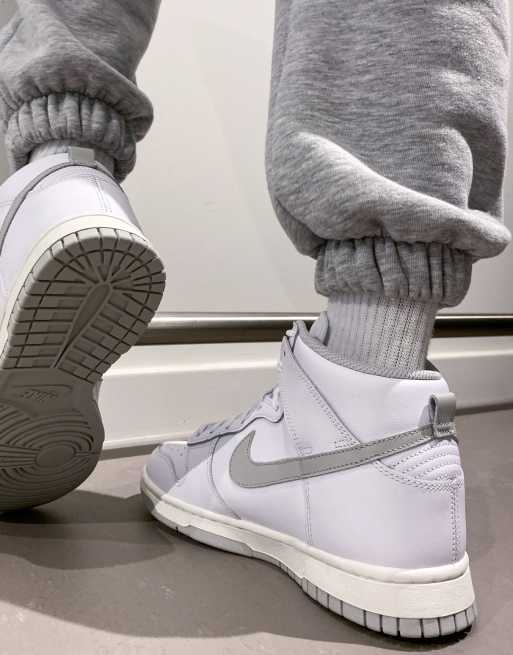 Nike Dunk High trainers in white and grey