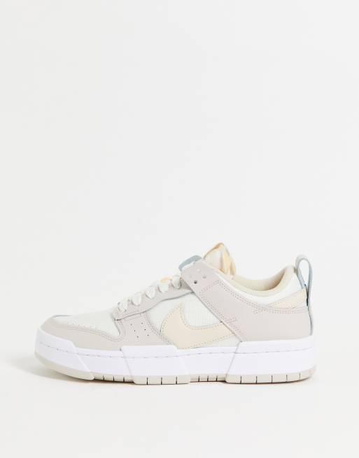 Nike Dunk Low Disrupt sneakers in off white and beige 