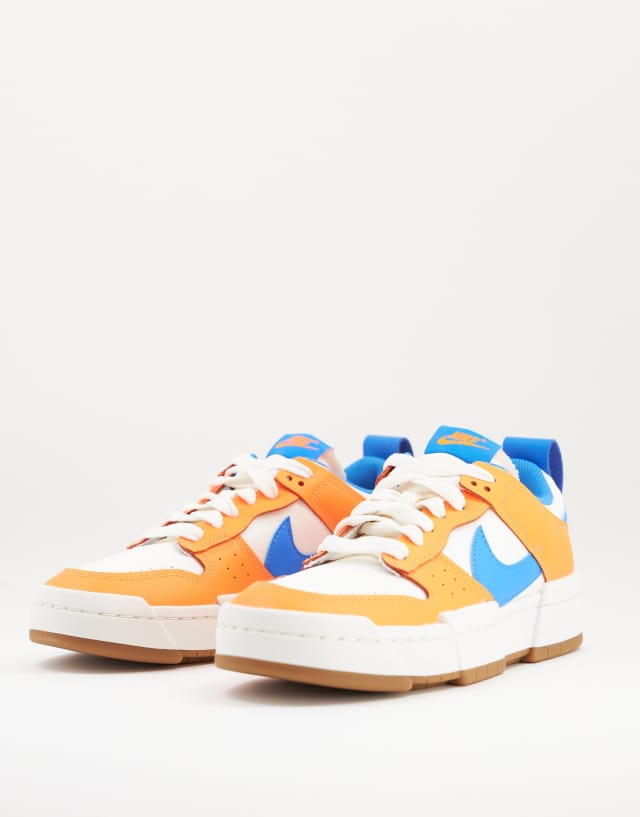 Nike Dunk Low Disrupt sneakers in white orange and blue