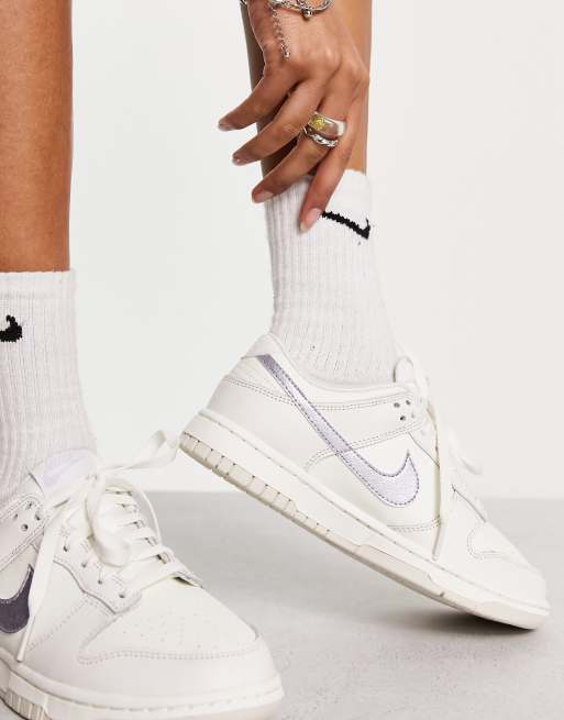 Nike Dunk Low ESS Trend sneakers in white and gray